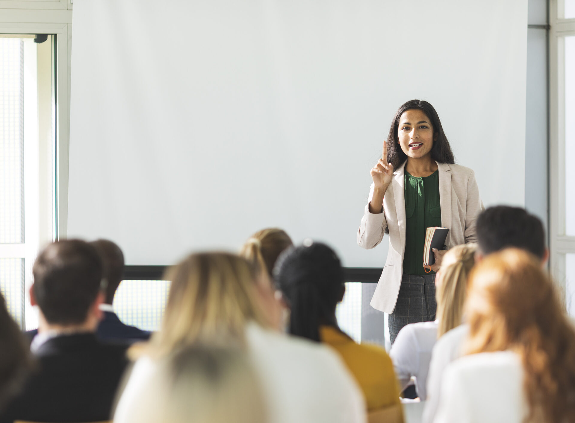 Businesswoman speaking at a seminar