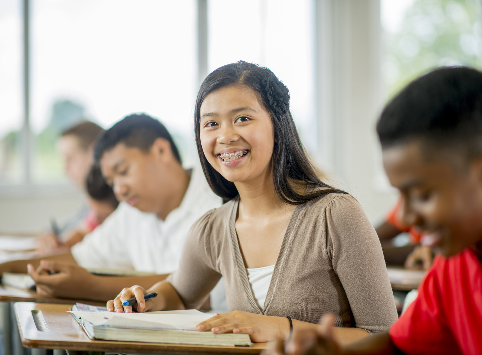 High school student smiling at camera