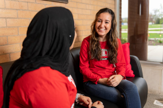 two female students talking