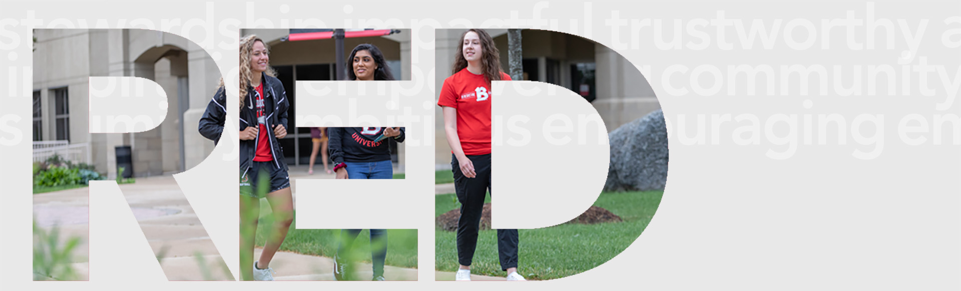 RED Thread letters with female students walking on campus