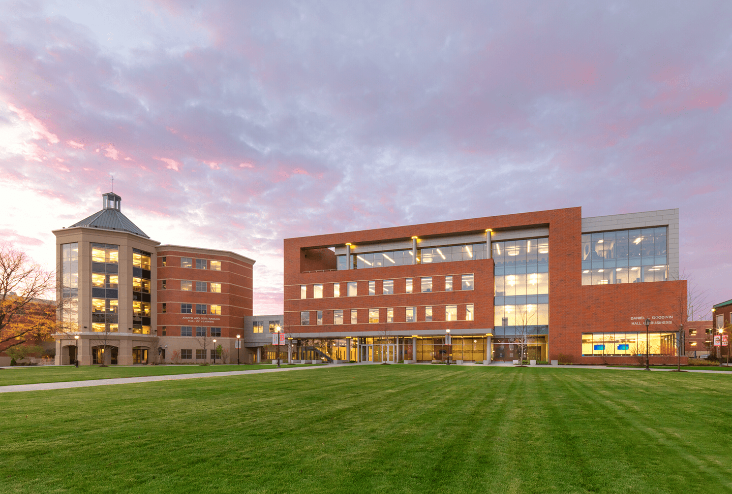 Goodwin Hall and Kindlon Hall at sunset with purple/blue clouds behind the buildings