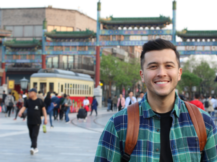 Male student with backpack in Chinese City