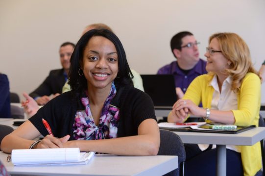 Adult female in classroom, portrait, professional