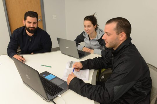 Classroom, adult students, laptops