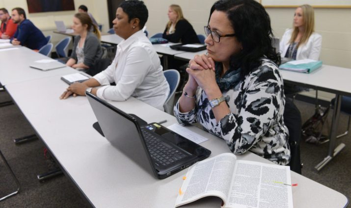 female, adult student, classroom, laptop