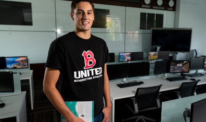 Male student in Goodwin Trading Lab
