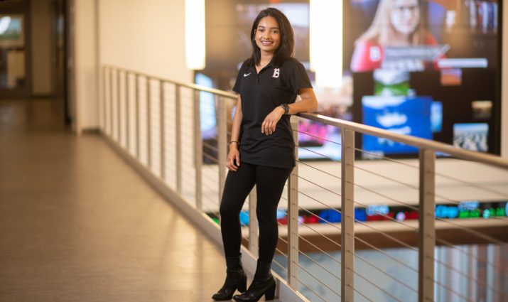 Female student posing in Goodwin Study area