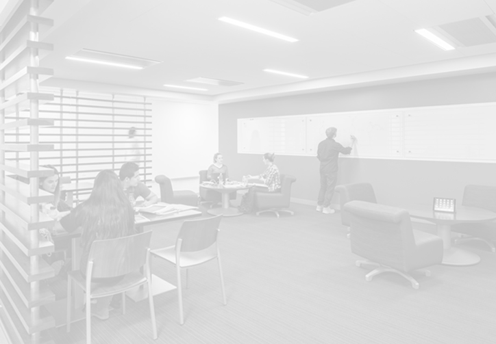 students studying in the lounge in Birck Hall, this photo has a light gray overlay; graduate students