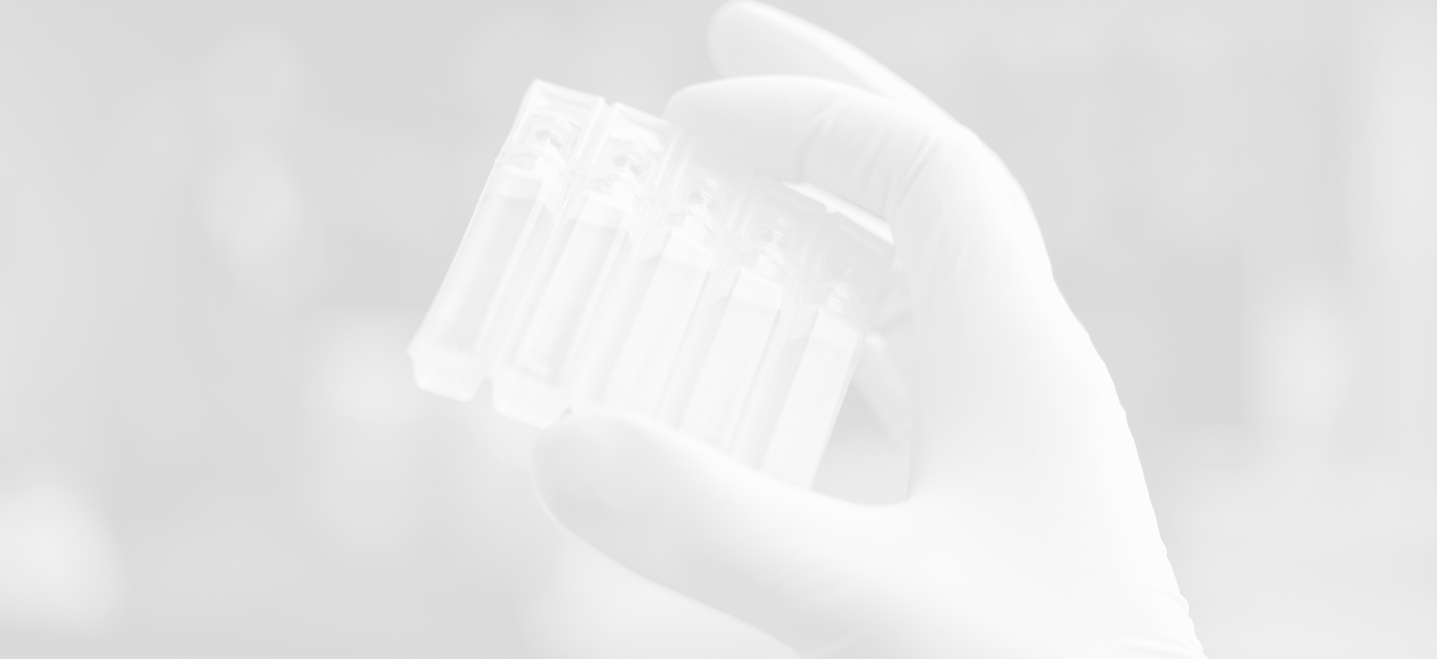 hand holding specimens, image has a white overlay; clinical laboratory science