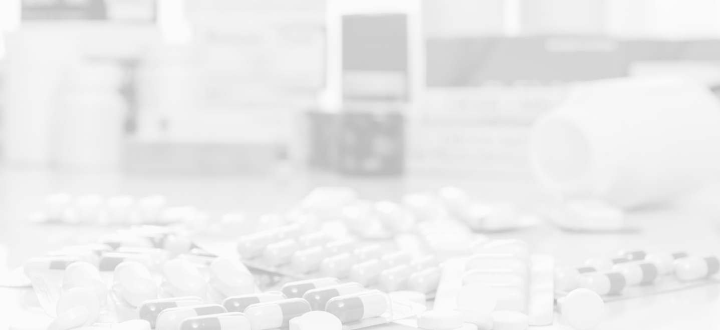 bottle of pills spilled out on a table, image has white overlay; pre-pharmacy program