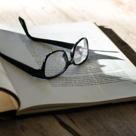 glasses on a book