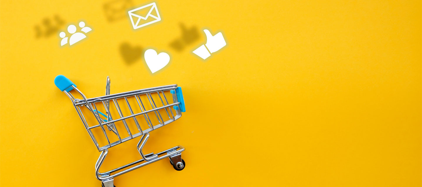 grocery cart with icons floating above it; marketing program