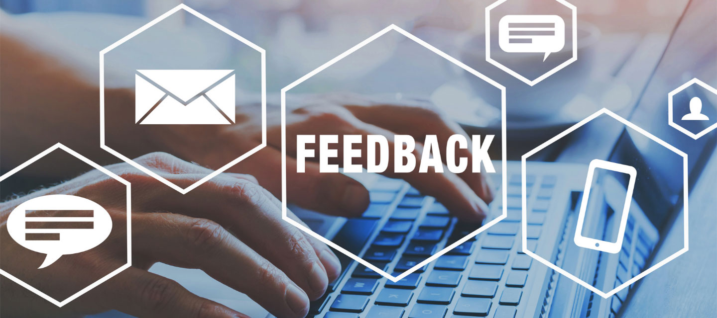 hands typing on keyboard with graphic communications icons in an overlay; management and organizational behavior