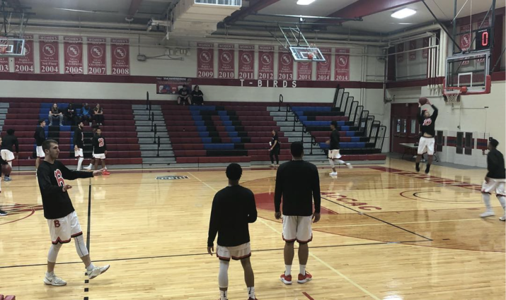 Mesa's athletic ministry group playing basketball