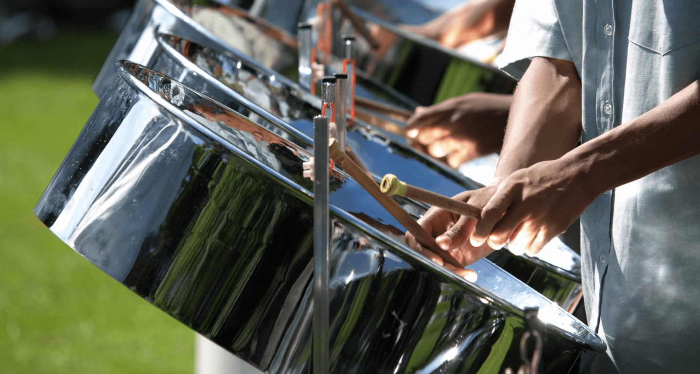 close up of student playing drum in a drumline