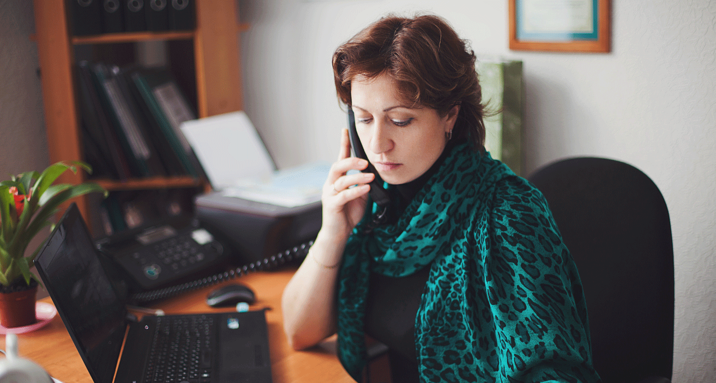 master of public health program. professionally dressed woman on the phone