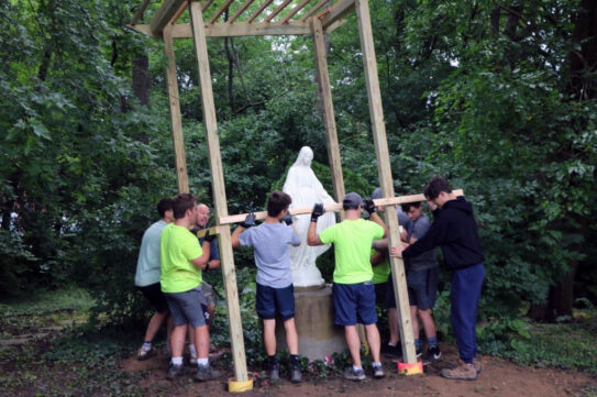 John Viehmann and scout troop update Mary statue