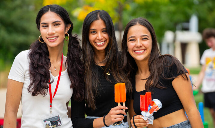 BenU Carnival three girls eating popsicles